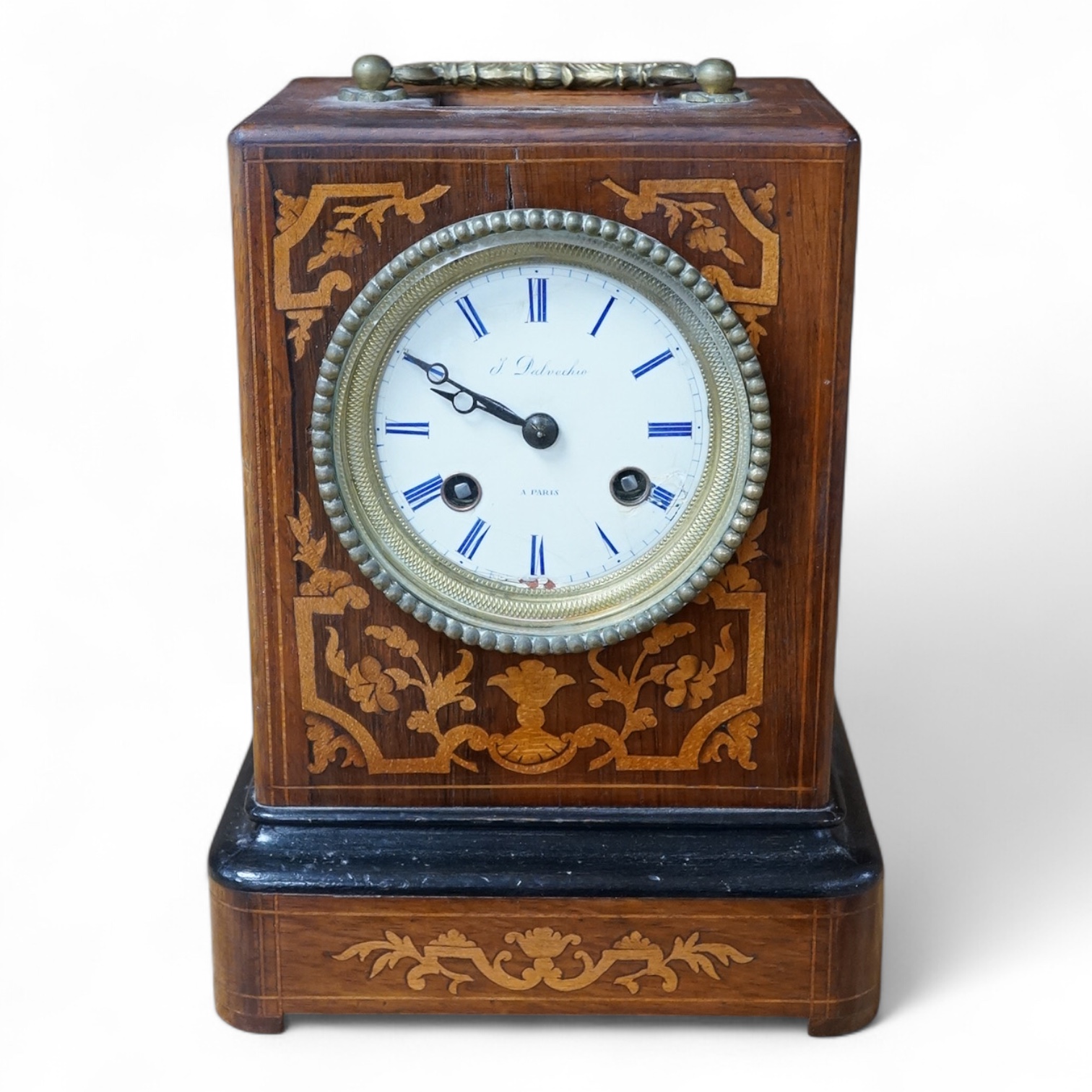 A marquetry mantel clock, dial signed J Dalvechio a Paris, Marti movement, 21cm high. Condition - attention needed to silk suspension, case has a fine crack above clock face.